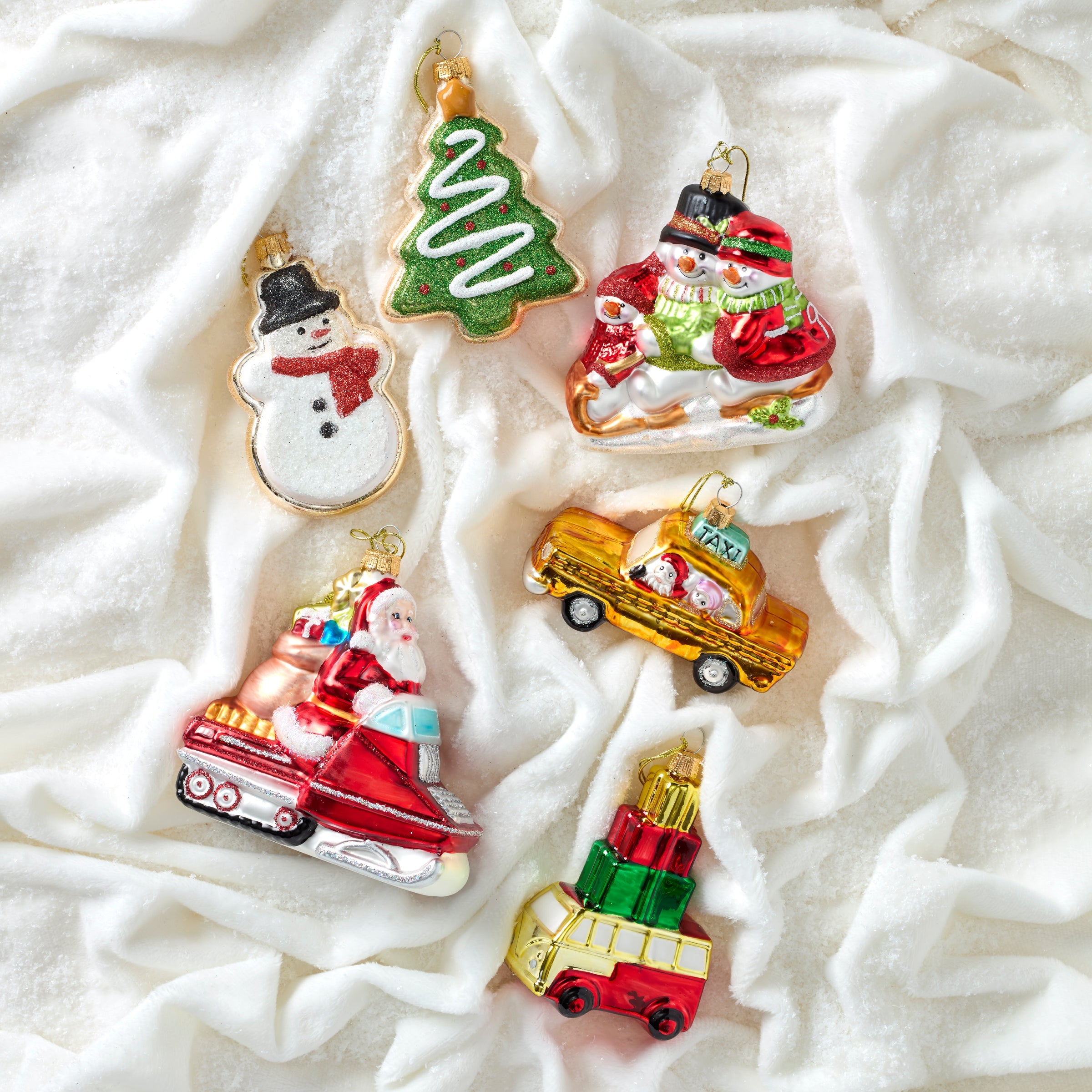Blown Glass Santa On Snowmobile Ornament